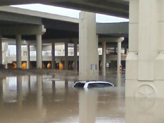 Illustration for article titled Turn Around Don't Drown: Houston Street Flooding Mega-Gallery
